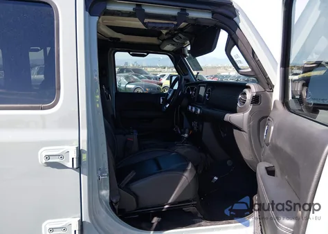 2023 Jeep Wrangler 4Xe Sahara 4X4 z USA, uszkodzony, nr VIN 1C4JJXP65PW683521